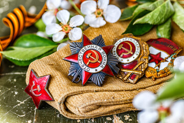 Naklejka premium Orders and medals of the USSR.Awards of the Second world war close-up.Victory Day - 9 of may 1945. Soviet military awards.Phaleristics.Antikvariat.