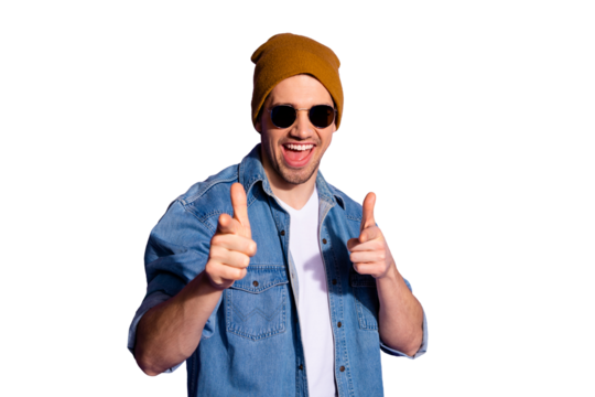 Photo of cheerful excited handsome man pointing at you wishing you to be chosen wearing cap headwear isolated over violet vivid color background