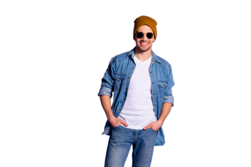 Photo of cheerful handsome cool guy holding his hands in jeans pockets smiling toothily standing confidently isolated over purple vivid color background