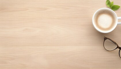 Light wood desk with coffee, glasses, and greenery Ample copy space