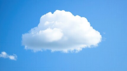 A fluffy white cloud drifting in a bright blue sky, symbolizing tranquility and nature's beauty