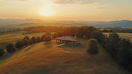 Fototapeta premium serene hilltop rental home surrounded by panoramic fields at golden hour, evoking tranquility