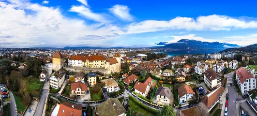 Gordijnen France travel and landmarks. Romantic beautiful old town of Annecy, aerial drone panoramic view with medieval castle.. © Freesurf