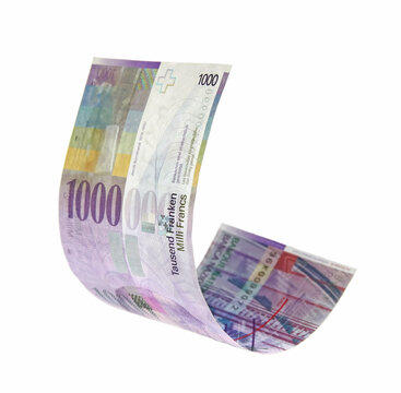 Flying Swiss money - the new issue of thousend francs note, isolated with clipping path