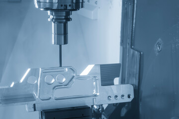 The 5-axis CNC milling machine  cutting the aerospace part with solid ball end mill tool in the light blue scene.