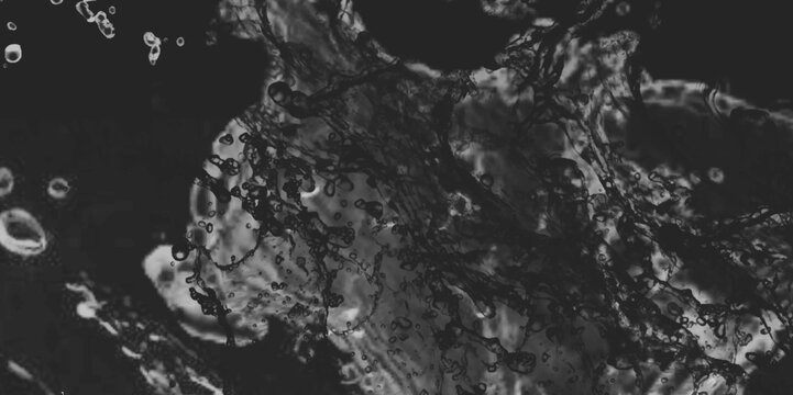 water splash on black background. water splash black background backdrop fresh. Blurred images of close-up soda water bubbles fizzing up or splashing or sparkling like a exploding of a bomb .