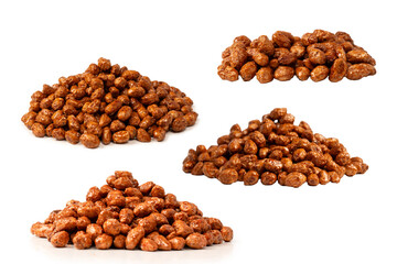 Tasty sweet roasted peanuts isolated on a white background.