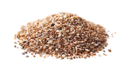 Pile of mixed coarse and fine sand grains on white background.