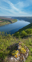 Amazing spring view on the Dnister River Canyon with picturesque rocks, fields, flowers. This place named Shyshkovi Gorby,  Nahoriany, Chernivtsi region, Ukraine.