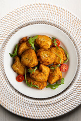 Cod fritters, a traditional Spanish tapa. Top view table.