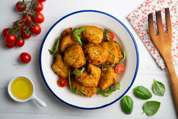 Cod fritters, a traditional Spanish tapa. Top view table.