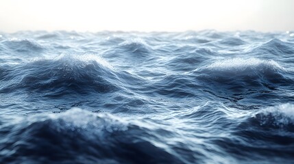 Fototapeta premium Rolling blue sea surface with gentle waves, sparkling sunlight reflecting on crests, horizon with bright diffused light.