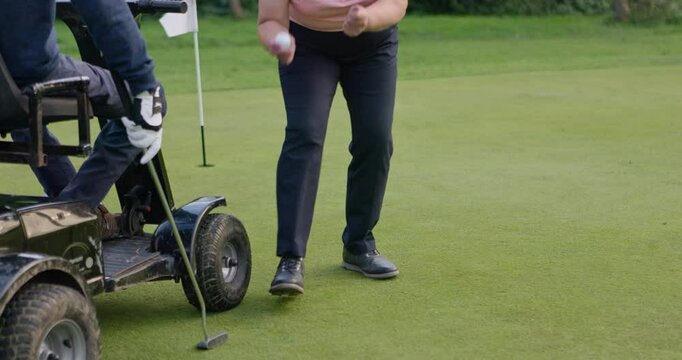 Wheelchair, golf and senior man on course for playing game, training or sports for recreation. Retirement, golfer and elderly person with disability and golfing club and ball for fun, hobby and swing