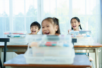Group of diverse children enjoy learning about the STEM.