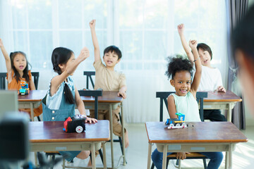 Group of diverse children enjoy learning about the STEM.