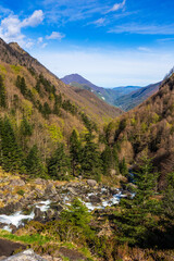 View over the Ars Valley towards Aulus-les-Bains from the Ars Waterfall, in the Pyrenees region of...