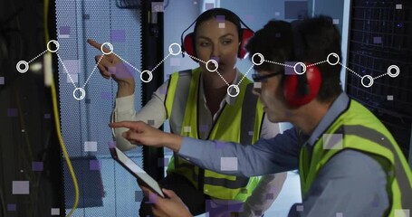 IT technicians crouching in server room, examining tablet while displaying digital data overlay - Powered by Adobe