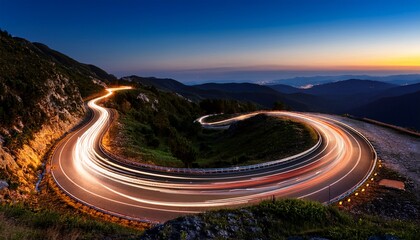 panoramic cars light trails at night in a curve road