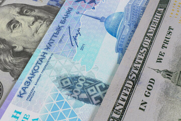 Banknotes of Kazakhstani tenge and US dollar. Cash. Financial concept.