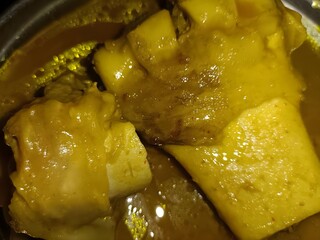 Rich and spicy flavors of traditional trotters curry, slow-cooked to tender perfection in a fragrant, golden sauce. A timeless delicacy for true food lovers!