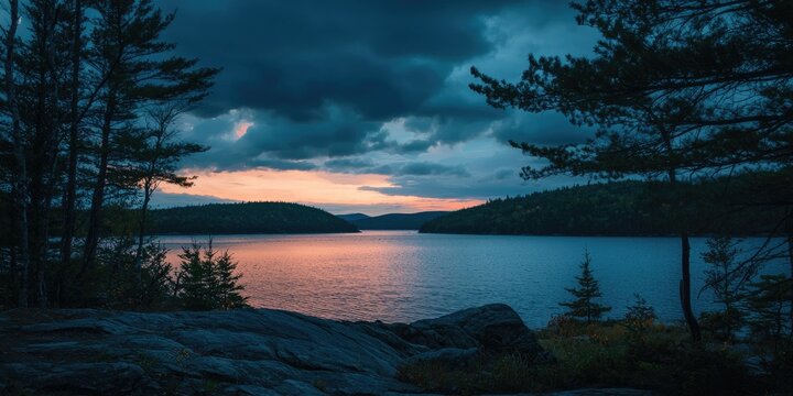 A sunset sky with darkening hues and a glowing horizon
