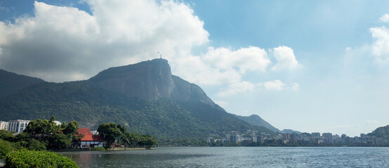 City Rio de Janeiro Christ the Redeemer lake lagoon stone Gávea neighborhood hill mountain vegetation nature blue sky cloud helicopter heliport landscape vacation travel beauty