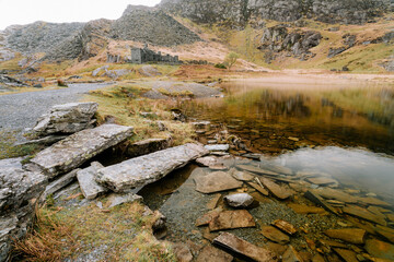 Eryri Snowdonia national park North Wales Cwmorthin lake and old slate quarry building
