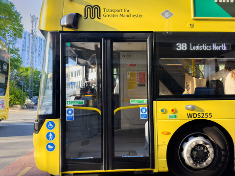 The 38 - TfGM Bee Network bus at bus stop