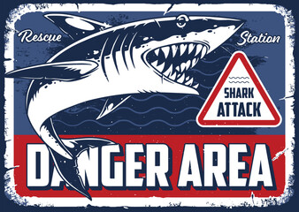 Warning sign for shark attack danger area at beach