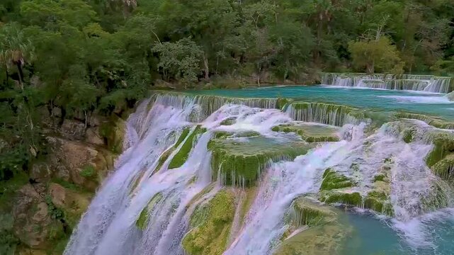 Turquoise water cascading at el salto waterfall in san luis potosi