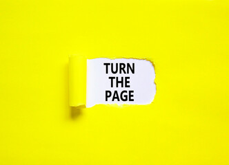 Turn the page symbol. Concept words Turn the page on beautiful white paper. Beautiful yellow paper background. Business motivational lifestyle turn the page concept. Copy space.