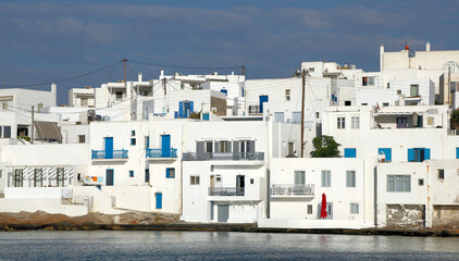The beautiful fishing village of Naoussa, Paros in the Greek Cyclades in the late afternoon sun..