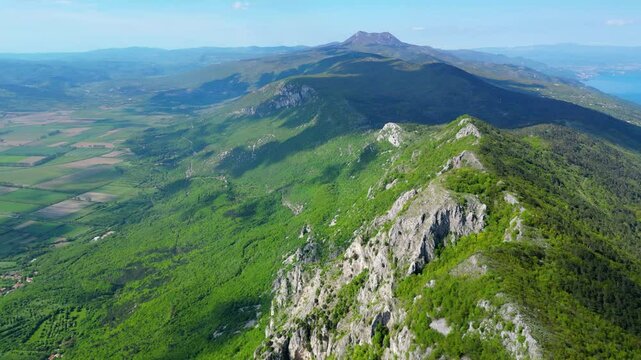 Aerial view of Sisol peak near Brseč, offering stunning views of Učka(Ucka) Nature Park, the Adriatic Sea, and Rijeka city. A beautiful hiking destination on the eastern coast of Istria, Croatia