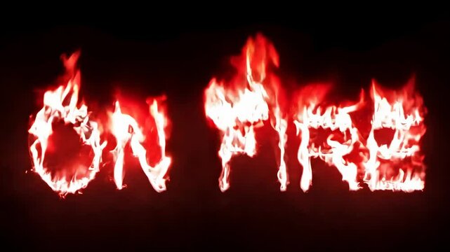 Text on fire with dramatic burning flames and glowing effect on dark background