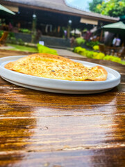 An enticing bowl of pasta served with a side of fresh greens, creating a balanced and delicious meal option.