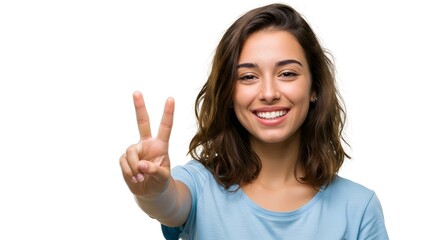 Portrait of a smiling woman with brown hair making a peace sign against a white background studio shot