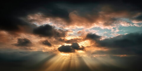 Dramatic clouds with sun rays piercing through