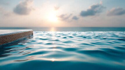 Tranquil infinity pool overlooking serene ocean horizon at sunset