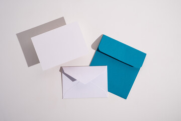 Paper envelopes on a light background. New mail, write a message. Send and receive mail. Postal...