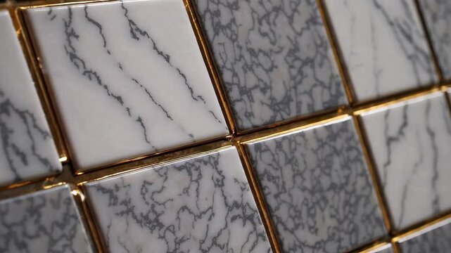 Luxurious marble tiles with gold grout seamlessly aligning in geometric patterns