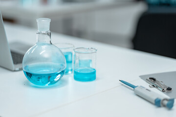 Chemical laboratory glassware with blue liquid samples in test tubes, scientific research experiment, biotechnology innovation, pharmaceutical analysis development, medical diagnostics