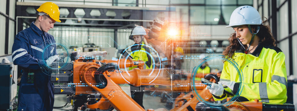 Engineers operating advanced robotic arms in a high-tech industrial factory, futuristic automation, modern robotics, innovative engineering solutions, smart manufacturing industrial technology