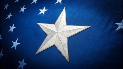 Close-up of large metallic star on textured blue background with smaller stars, concept of patriotism and honor