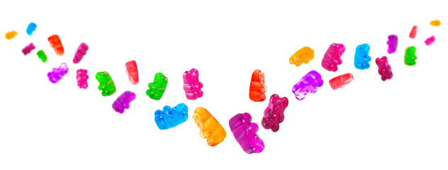 Flying colorful jelly bears isolated on a white background, jelly candies. Marmalade bears.
