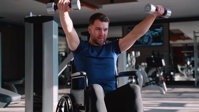 Man in wheelchair doing lateral raises