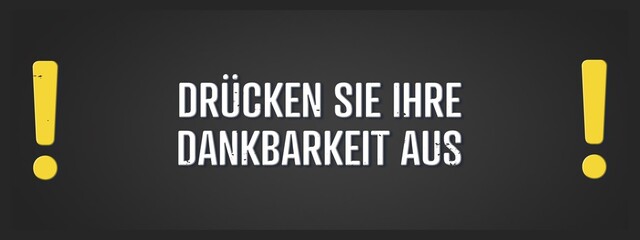 Fototapeta premium Druecken Sie Ihre Dankbarkeit aus (Express your gratitude) - A blackboard illustration with white text.