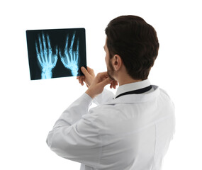 Doctor examining hand MRI scan on white background, back view