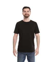 Obraz premium Man wearing blank black t-shirt on white background. Mockup for design