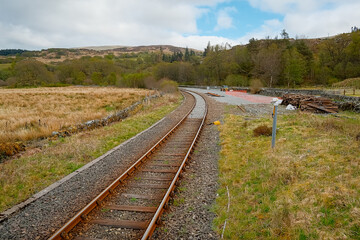 A train track running through the welsh countryside