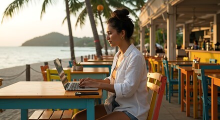 A young professional working on a laptop at a beachside café, with tropical scenery in the background, illustrating the digital nomad lifestyle, captured in a vibrant and relaxed atmosphere.